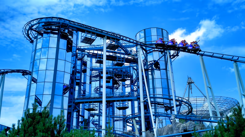 Rust, Germany - July 19, 2015: Guests at Europa-Park enjoy the Euro-Mir spinning roller coaster.