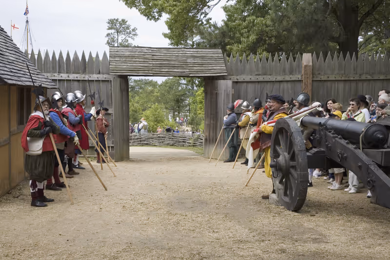 English reenactor soldiers standing at attention at front gate of James Fort, Jamestown Settlement, on 400th Anniversary of Jamestown, Virginia, May 4, 2007