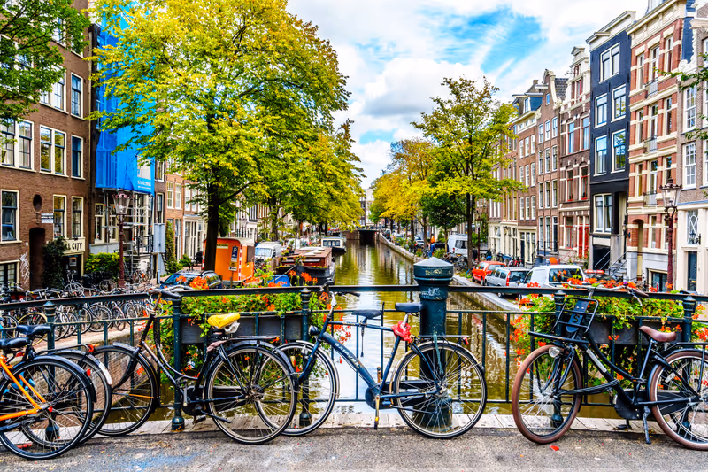 Amsterdam, the Netherlands - Sept 28, 2018: Historic Gable Houses along the Bloemgracht viewed from the Tweede Leliedwarsstreet Bridge in the historic Jordaan district in the old center of Amsterdam