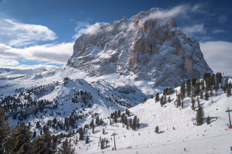 Ski pistes in Val Gardena at the Dolomites Apls, Italy with cable car in the foreground