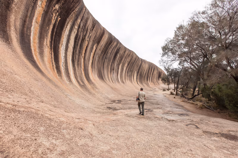 Wave Rock, Hyden, Western Australia, in scale to walking man, December 62011,