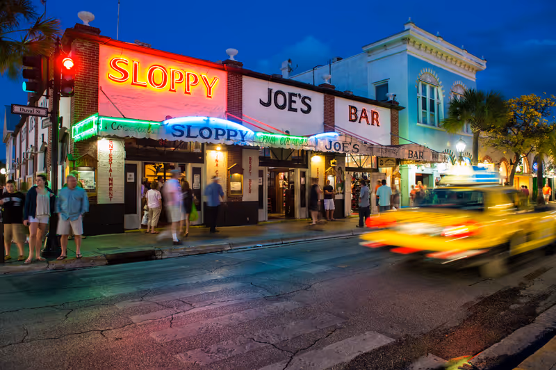 KEY WEST, FL - CIRCA 2012: View Slopppy Joe's Bar in Duval Street a landmark in Key West circa 2012. The tropical city is a popular tourist destination with over 2 million yearly visitors.