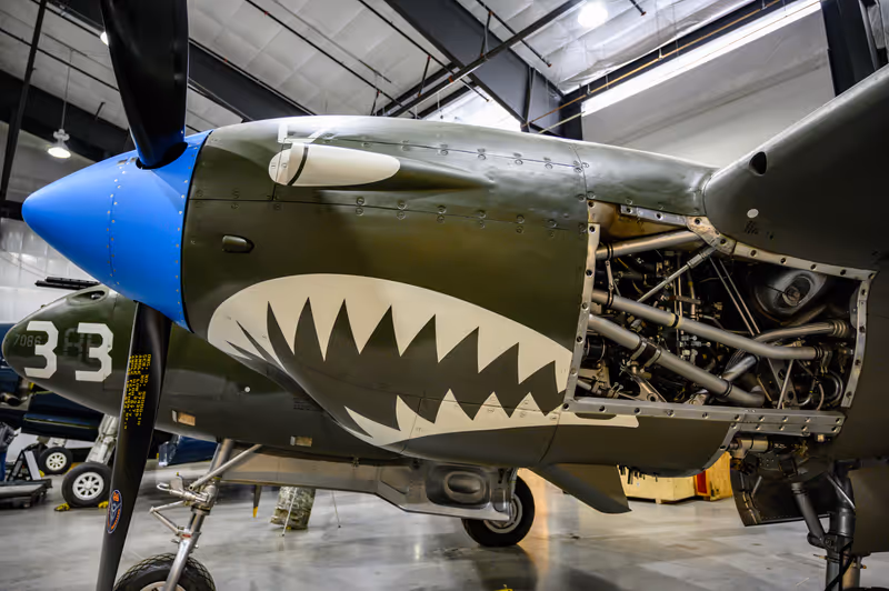 National Museum of World War II Aviation, Colorado Springs, Colorado, USA - 5/2019: Lockheed P-38 Lightning side view of open engine and propeller