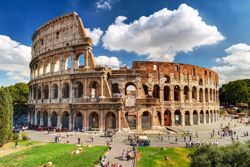 Colosseum in Rome, Italy. Ancient Roman Colosseum is one of main tourist attractions in Europe. People visit famous Colosseum in Roma city center. Scenic nice view, photo of Colosseum ruins in summer