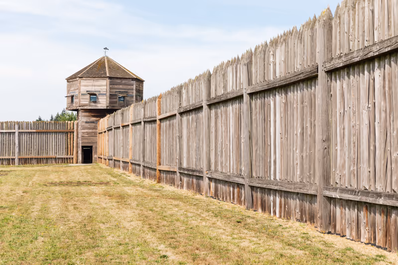 USA, Washington State, Fort Vancouver National Historic Site. Stockade wall and watch tower at the Hudson's Bay Company's Fort Vancouver.