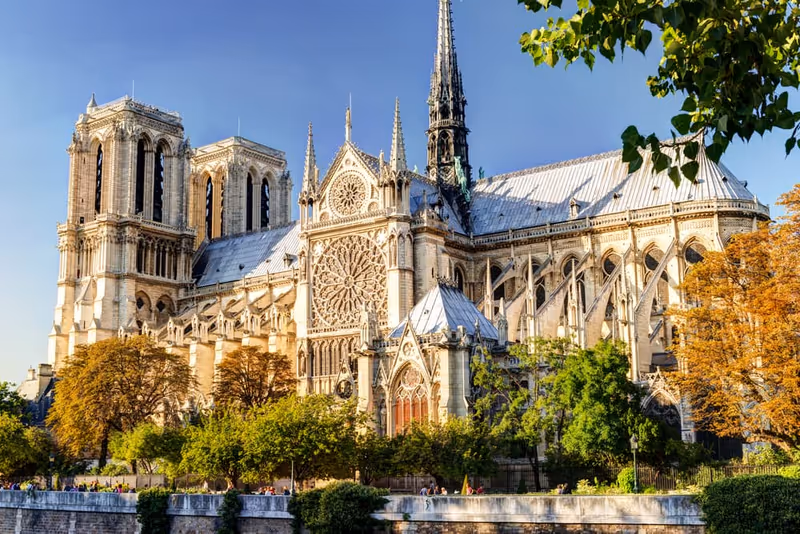 Notre Dame de Paris cathedral, France. Old Notre Dame is famous historical landmark of city. Scenery of Gothic church, nice architecture in summer.