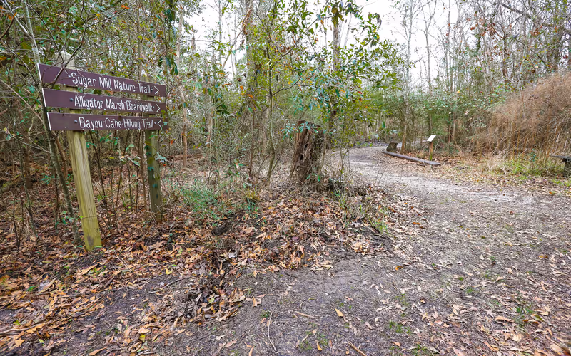MANDEVILLE, LOUISIANA, UNITED STATES - Feb 06, 2018: Fontainebleau State Park, Louisiana - February 2018: Sign mark the trailhead for several hiking trails inside Fontainebleau State Park.