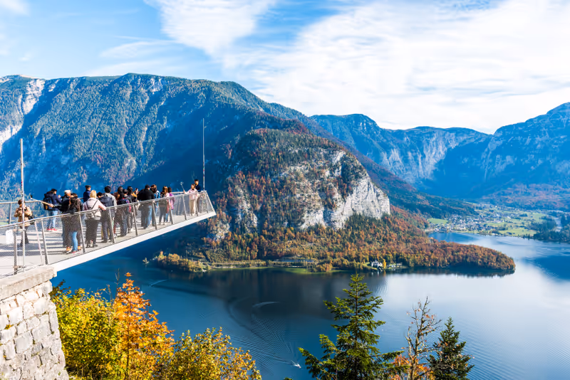 HALLSTATT, AUSTRIA - October 19, 2019: Hallstatt Skywalk World Heritage View (Welterbeblick). This viewing platform is 350 meters above of Hallstatt. Tourists visiting Skywalk platform.