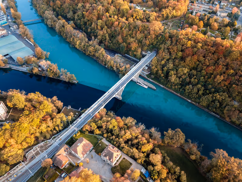 Aerial view of Junction between Rhône and Arve rivers in Geneva, Switzerland, shot in Autumn. Vue aérienne de la Jonction entre les deux rivières prise en automne par un drone, Genève, Suisse.