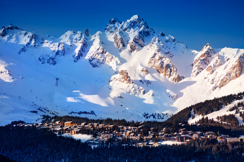 Panorama of Courchevel valley and ski resort with Alps mountain peaks view from Champagny-en-Vanoise