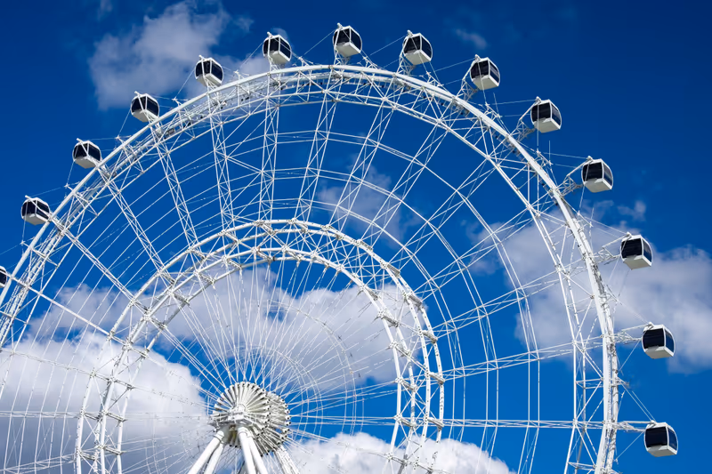 Orlando, Florida, US - November 2021: The Wheel at ICON Amusement Park stands over 400 feet with a view from 360 degrees. A Ferris wheel ride and attraction for many tourists on International Drive.