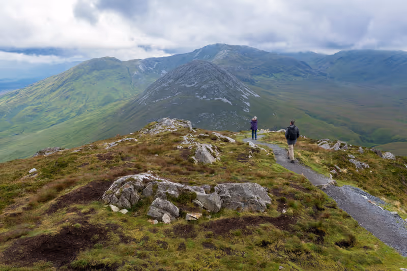Hikers on a mountain of Connemara national Park, Ireland