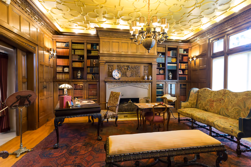Portland, Oregon, USA - June 28th, 2022: Famous historical landmark, Pittock Mansion building library room interior