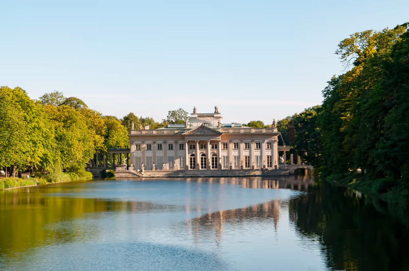 WARSAW, POLAND - JULY 14, 2022: The Palace on the Isle, Baths Palace at Warsaw's Royal Baths Park (Polish: Pałac na Wyspie, Pałac Łazienkowski w Łazienkach) on a sunny summer day