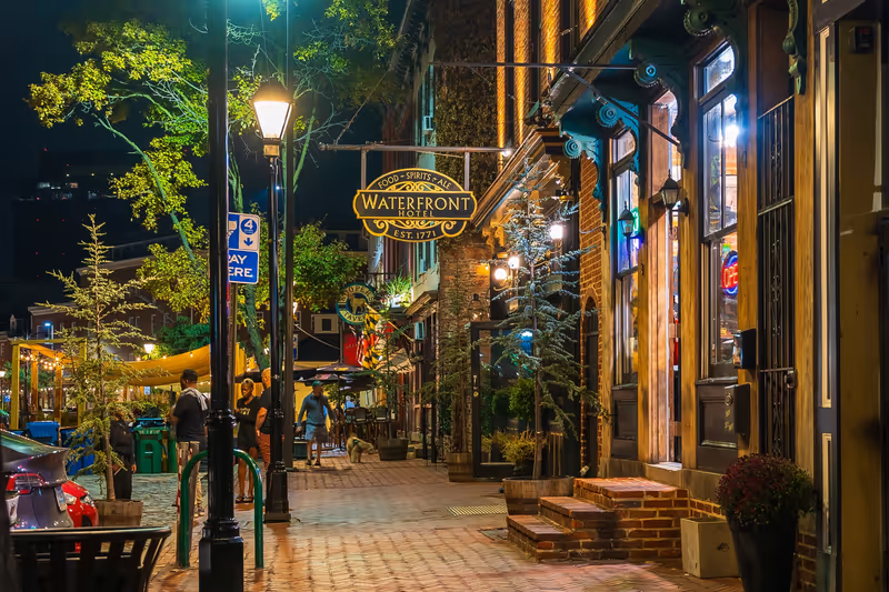 Baltimore, Maryland US - SEPTEMBER 25, 2022: Historic brick buildings along Thames street in downtown Fell's Point neighborhood restaurants and bars for dining