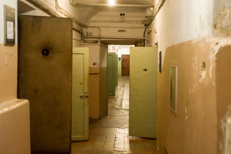 Vilnius, Lithuania. November 27, 2014. Museum of Occupations and Freedom Fights. Prison corridor with open cell doors