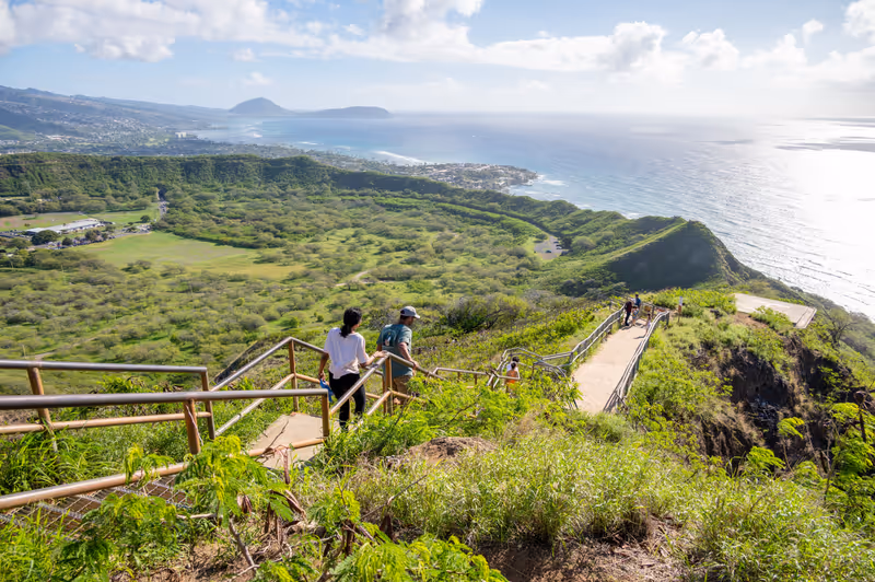 Honolulu, Hawaii - December 27, 2022: Tourists hiking on the Diamond Head lookout trail.