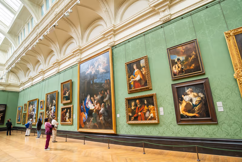 London, UK - June 11, 2018: People looking at the classic old master oil paintings hanging in The National Gallery