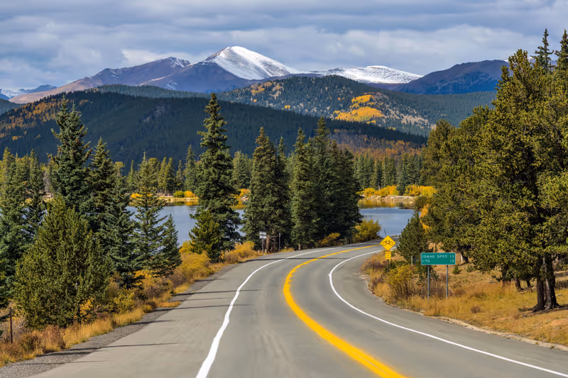 Mt. Blue Sky Scenic Byway - An Autumn day view of Mt. Blue Sky Scenic Byway at Echo Lake, with snow-capped Mt. Blue Sky towering in background. CO, US