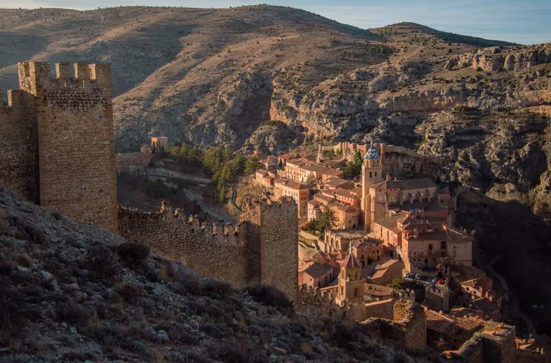 Albarracin in Teruel Spain, with red sandstone terracotta medieval houses, Moorish castle, Albarraccin cathedral and ancient city walls voted most beautiful Spanish village