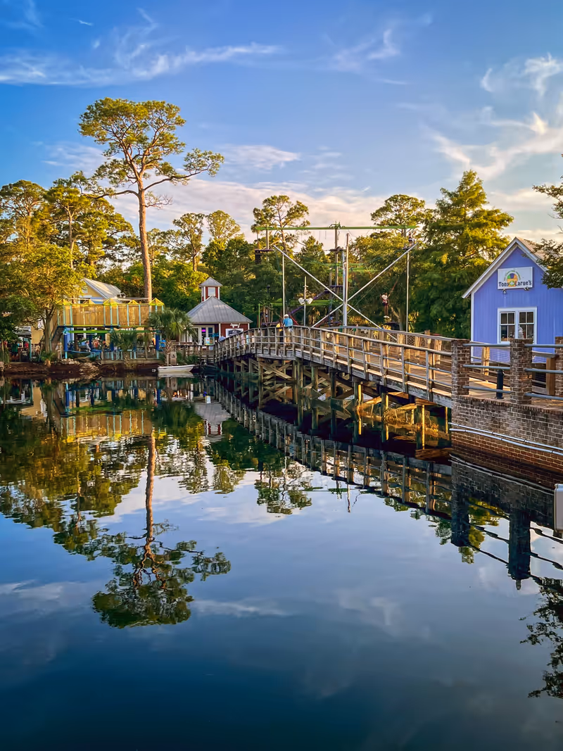 SANDESTIN, FLORIDA - JUNE 6: The quaint waterside village, Baytowne Wharf with shopping and dining on June 6, 2024 in Sandestin, Florida.