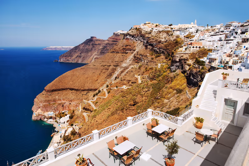 View from a cafe of Fira's famous 587 steps and old town. Santorini Greece