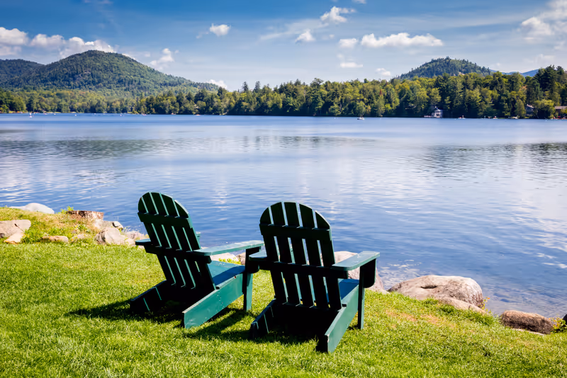 Adirondack chairs. Mirror Lake, Lake Placid New York. Summer, vacation, outdoors, travel, explore, nature, camping, lake and mountain vacation concept