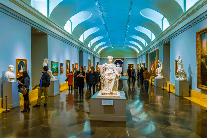 MADRID, SPAIN, JANUARY 9, 2016: People are strolling through corridors of the prado gallery and enjoying view of painting masterpieces