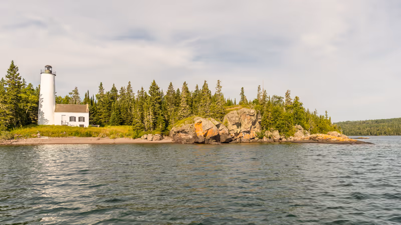 Rock Harbor Lighthouse stands at the intersection of Moskey Basin, Middle Islands Passage, Tonkin Bay, and Lake Superior, in Isle Royale National Park, Michigan.