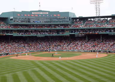 BOSTON - JUNE 3: Red Sox vs Athletics: Red Sox Pitcher Tim Wakefield throws a pitch to an Oakland Athletic.  taken June 3, 2010 Fenway Park Boston, Massachusetts from the outfield bleachers.