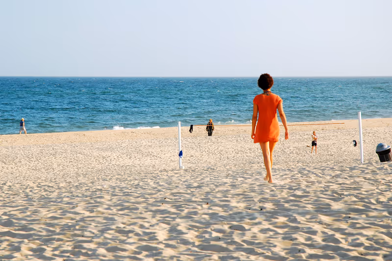 East Hampton, NY, USA July 27, A young woman finds Solitude on East Hampton's Main Beach