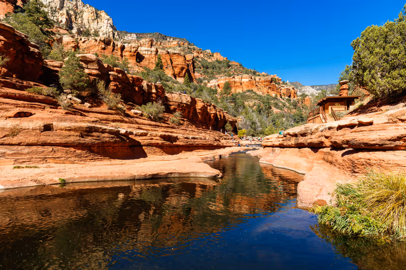 Coconino, AZ USA - October 17, 2016: Visitors enjoying the beauty of Slide Rock State Park with its natural rock water slides in the Oak Creek Canyon near Sedona.