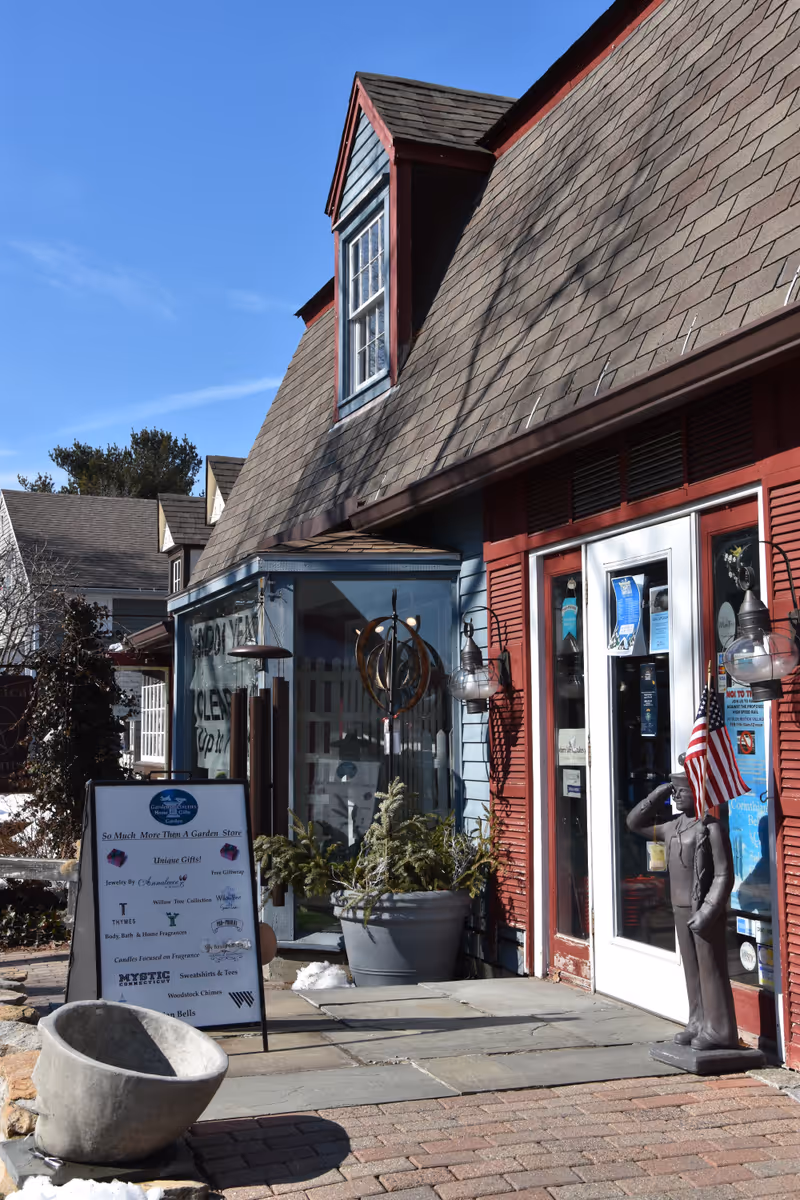 MYSTIC, CT - FEB 18: Olde Mistick Village in Mystic, Connecticut, as seen on Feb 18, 2017. The village houses a unique collection of specialty shoppes and restaurants.