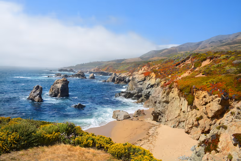 Coastal mountains landscape, view from highway 1.Beautiful mountains and ocean landscape.Beautiful summer mountain coastal landscape. Garrapata State Park and beach, Big Sur, California, USA.