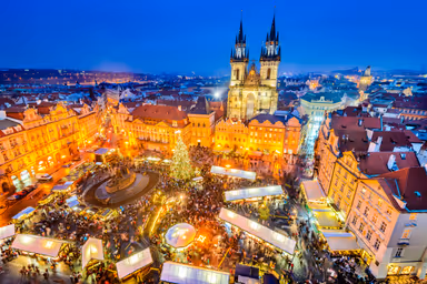 Prague, Czech Republic. Christmas Market in Stare Mesto old square, Tyn Church, Bohemia.