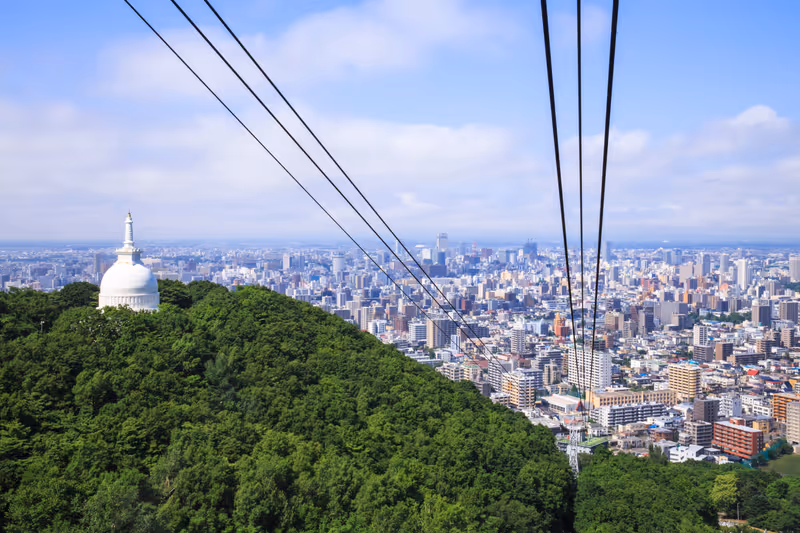 view of Sapporo City, Looking from Ropeway (Cable Car) On the way up to Mount Moiwa,Hokkaido,Japan