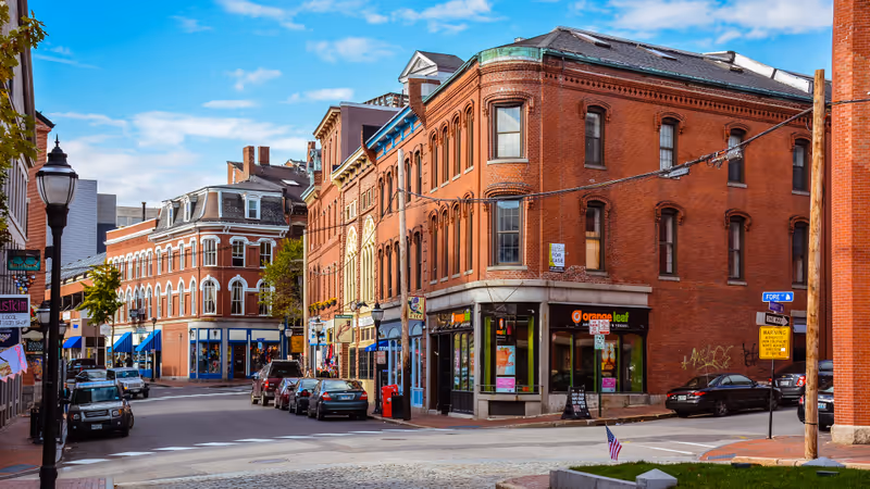 Portland, ME - Oct. 24, 2014: Corner of Fore & Market Sts. of Historical Old Port, a district of Portland, Maine, known for its cobblestone streets, 19th century brick buildings and fishing piers.