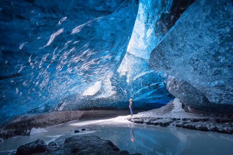 Vatnajokull, Iceland -10 MARCH, 2014: A man standing in Vatnajokull ice cave.