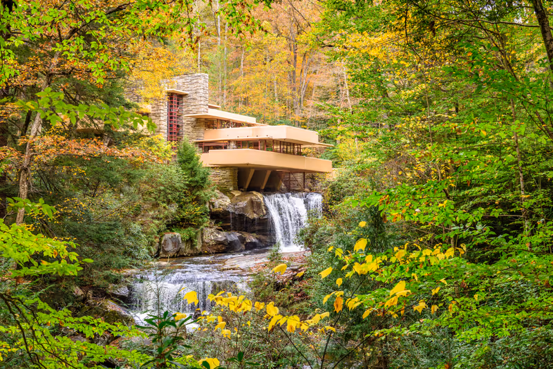 MILL RUN, PENNSYLVANIA, USA - OCTOBER 24, 2017: Fallingwater over Bear Run waterfall in the Laurel Highlands of the Allegheny Mountains.