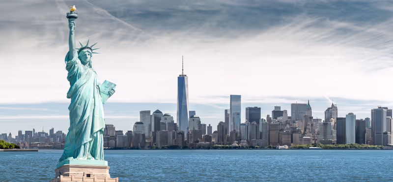 The Statue of Liberty with One World Trade Center background, Landmarks of New York City, USA