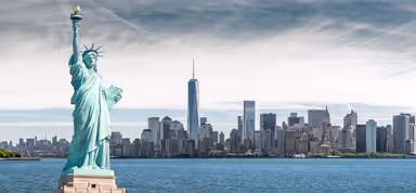 The Statue of Liberty with One World Trade Center background, Landmarks of New York City, USA