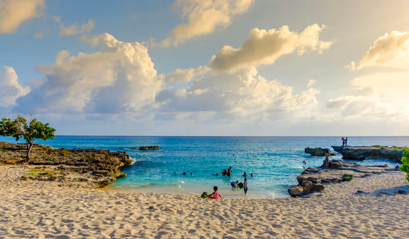 Grand Cayman, Cayman Islands, July 2017, Smith's Barcadere beach also known as Smith Cove in the South Sound at sunset