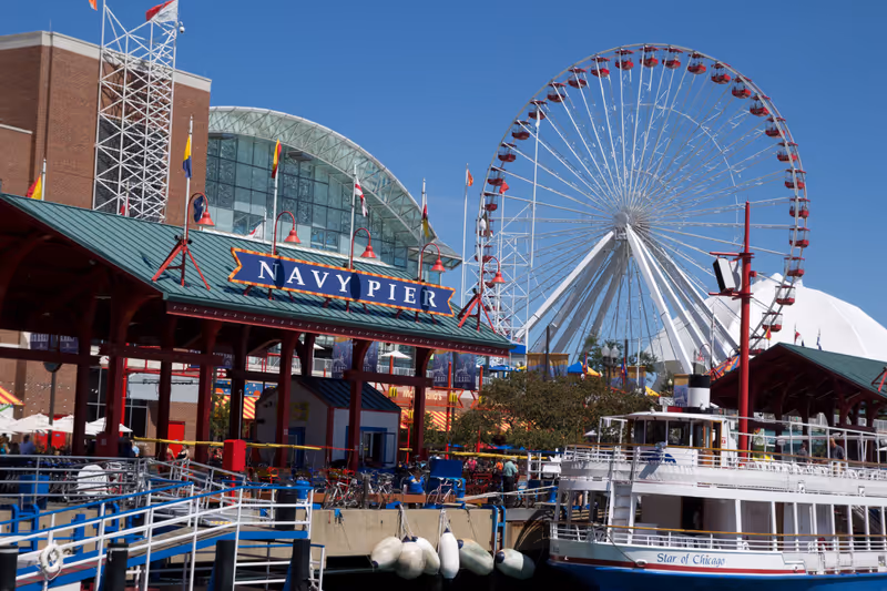 CHICAGO - AUGUST 26: Chicago´s number one tourist attraction, the Navy Pier, in Chicago on August 26, 2011. The Navy Pier is 3,300 ft long and built in 1916 at a cost of $4.5 million.